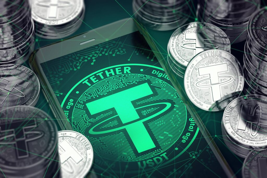 Tether Usdt Logo In Green Surrounded By Silver Coins.jpg