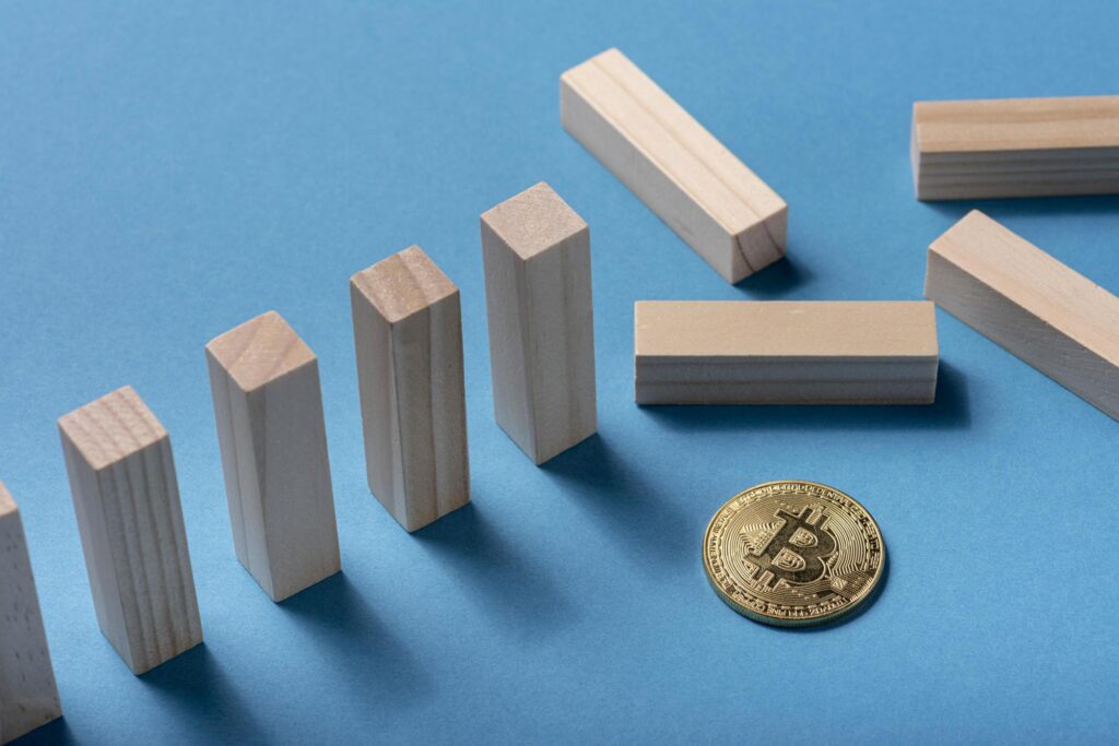 High angle domino pieces with bitcoin.jpg