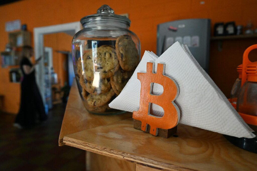 2196033549 a napkin holder with the b of bitcoin is seen in a cafeteria at the headquarters of the.j.jpeg