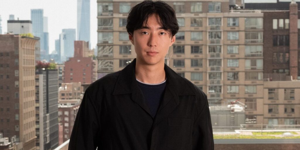 Eric full body portrait 1 e1754335764344.jpg